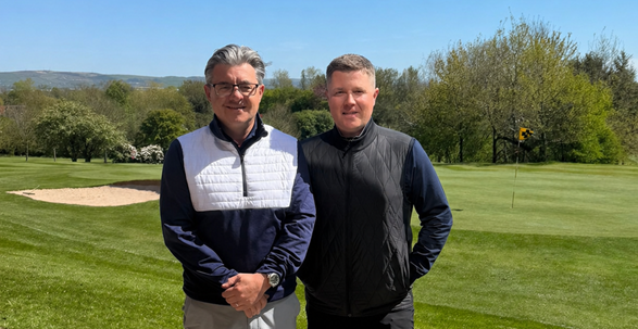 Two sales reps on the golf course